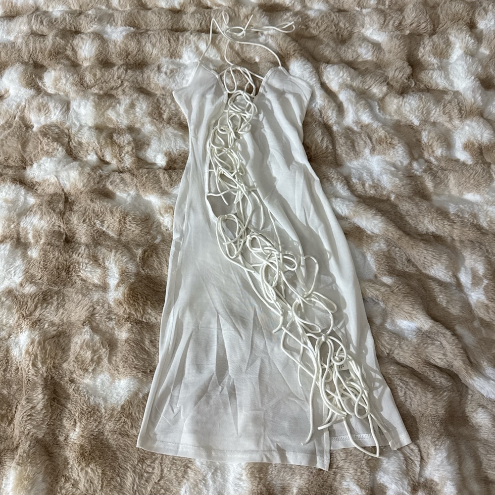 Elegant White Dress with Unique String Design